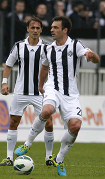 Adidas dres FK Partizan za sezonu 2013/14 sa imenom 